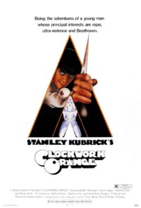 Poster for A Clockwork Orange featuring Malcolm McDowell’s character, Alex, peering menacingly through a triangle while holding a knife. Below him stands a stylized, doll-like female figure. The tagline above reads: “Being the adventures of a young man whose principal interests are rape, ultra-violence and Beethoven.”