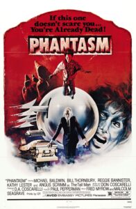 Poster for the horror film Phantasm, dominated by a red background and the tagline “If this one doesn’t scare you… you’re already dead!” It features a flying silver sphere with deadly blades, the ominous Tall Man looming over a coffin, and a terrified woman screaming on the right. Hooded figures and a floating boy add to the surreal, nightmarish imagery.
