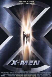 Poster for X-Men featuring a large metallic “X” with a glowing slit at the center, revealing silhouettes of the mutant team, led by Wolverine with claws extended. The tagline above reads, “Trust a few. Fear the rest,” capturing the film’s themes of secrecy, power, and prejudice.