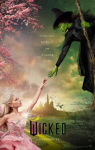 Poster for Wicked (2024), showing two main characters—Elphaba, the green-skinned Wicked Witch of the West, floating in dark robes and reaching out her hand, and Glinda, the pink-gowned Good Witch with a crown and wand, reaching up. Between them, text reads “Everyone deserves the chance to fly.” The background splits a lush, pink-flowered side with a darker, stormy side, with the Emerald City in the distance and the yellow brick road winding through the center. The title Wicked appears at the bottom above the release date, November 22.