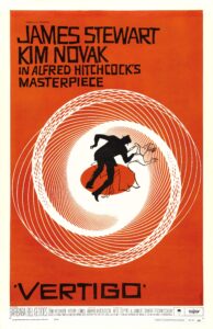 Poster for Alfred Hitchcock’s Vertigo featuring a bold orange background with a white spiral pattern radiating inward. At the center, silhouetted figures of a man and woman appear to fall or twist within the spiral, evoking dizziness and psychological instability. The top text reads “James Stewart Kim Novak in Alfred Hitchcock’s Masterpiece,” and the title “Vertigo” appears in large black letters at the bottom.